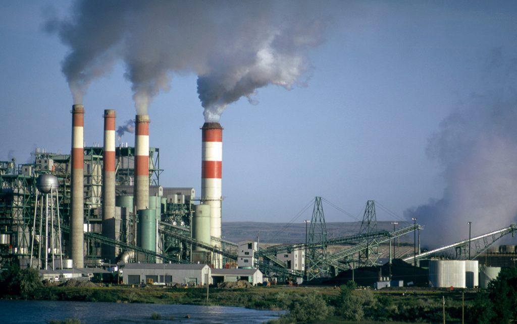 Refinery with smokestacks